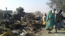 People walk at the site after a bombing attack of an internally displaced persons camp in Rann, Nigeria, January 17, 2017. PHOTO BY REUTERS/MSF