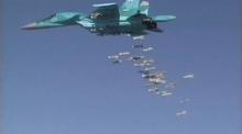 A still image, taken from video footage and released by Russia's Defence Ministry on August 18, 2016, shows a Russian Sukhoi Su-34 fighter-bomber based at Iran's Hamadan air base dropping off bombs in the Syrian province of Deir ez-Zor. PHOTO BY REUTERS/Ministry of Defence of the Russian Federation