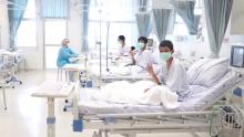 A screen grab shows boys rescued from the Thai cave wearing mask and resting in a hospital in Chiang Rai, Thailand from a July 11, 2018 handout video. PHOTO BY REUTERS/Government Public Relations Department (PRD) and Government Spokesman Bureau