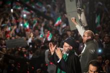 Iranian Presidential candidate Ebrahim Raisi (L) and Tehran Mayor Mohammad Baqer Qalibaf gesture during a campaign meeting at the Mosalla mosque in Tehran, Iran, May 16, 2017. PHOTO BY REUTERS/TIMA