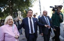 Top candidate and head of far-right Freedom Party (FPOe) Heinz-Christian Strache and his mother Marion Strache arrive at a polling station in Vienna, Austria, October 15, 2017. PHOTO BY REUTERS/Leonhard Foeger