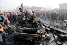 Wreckage at the site of a car bomb attack at a vegetable market in eastern Baghdad, Iraq January 8, 2017. PHOTO BY REUTERS/Wissm al-Okili