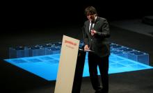 Catalan regional President Carles Puigdemont speaks next to ballot boxes during a meeting about the terms and conditions of a proposed independence referendum in Barcelona, Spain, July 4, 2017. PHOTO BY REUTERS/Albert Gea