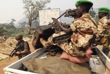 Chadian African Union soldiers patrol during a joint Chad MISCA French army patrol in Wouango district