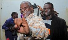 Tanzanian presidential candidate of the ruling Chama Cha Mapinduzi (CCM) party John Pombe Magufuli shows his inked finger after casting his vote during the presidential and parliamentary election at his hometown Chato district, in Geita region, October 25, 2015. PHOTO BY REUTERS/Stringer