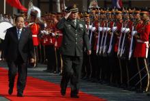 China's Defence Minister Chang Wanquan, accompanied by Thailand's Deputy Prime Minister and Defence Minister Prawit Wongsuwan (L), reviews a guard of honour during his visit to Thailand, at the Defence Ministry in Bangkok, February 6, 2015. PHOTO BY REUTERS/Chaiwat Subprasom