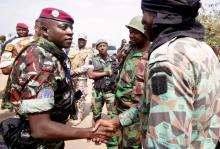 Lieutenant-Colonel Cherif Ousmane greets mutinous soldiers at the airport in Bouake, Ivory Coast, January 13, 2017. PHOTO BY REUTERS/Thierry Gouegnon