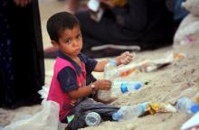 A displaced Iraqi child, who fled from Islamic State violence from Saqlawiyah, near Falluja, is seen in the town of Khalidiya, north of Baghdad, July 15, 2015. PHOTO BY REUTERS/Stringer
