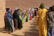 Children queue before school starts in Kidal, Mali, October 20, 2015. PHOTO BY REUTERS/Souleymane Ag Anara