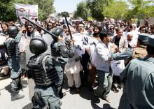 Afghan policemen clash with demonstrators during a protest in Kabul, Afghanistan, June 2, 2017. PHOTO BY REUTERS/Mohammad Ismail