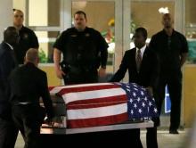 Following a public viewing, the coffin of U.S. Army Sergeant La David Johnson, who was among four special forces soldiers killed in Niger, is taken from Christ The Rock Church in Cooper City, Florida, October 20, 2017. PHOTO BY REUTERS/Joe Skipper