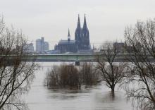Cologne cathedral is seen with the flooded river Rhine in Cologne, January 9, 2011. PHOTO BY REUTERS/Ina Fassbender