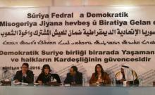 Bureau members of a preparatory conference to announce a federal system discuss a "Democratic Federal System for Rojava - Northern Syria" in the Kurdish-controlled town of Rmeilan, Hasaka province, Syria March 16, 2016. PHOTO BY REUTERS/Rodi Said