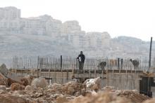 Palestinian labourers work at a construction site in the Israeli settlement of Efrat, in the occupied West Bank, December 29, 2016. PHOTO BY REUTERS/Baz Ratner