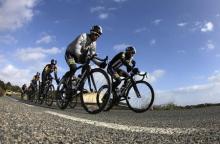 Eritrean cyclist Natnael Berhane (L) and Adrien Niyonshuti of Rwanda lead fellow MTN-Qhubeka team team members during a training ride on the Spanish island of Mallorca, January 24, 2015. PHOTO BY REUTERS/Enrique Calvo