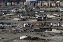General view of shelters the day after a fire destroyed large swathes of the Grande-Synthe migrant camp near Dunkirk in northern France April 11, 2017 following skirmishes on Monday that injured several people. PHOTO BY REUTERS/Pascal Rossignol