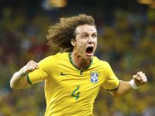 Brazil's David Luiz celebrates after scoring a goal against Colombia during the 2014 World Cup quarter-finals soccer match at the Castelao arena in Fortaleza