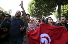 Unemployed graduates shout slogans during a demonstration to demand the government provide them with job opportunities, on Habib Bourguiba Avenue in Tunis, Tunisia, January 20, 2016. PHOTO BY REUTERS/Zoubeir Souissi
