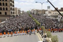 Followers of the Shi'ite Houthi group pray during a rally to denounce fuel price hikes and to demand for the resignation of the government in Sanaa