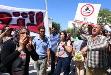 People demonstrate against a bill that would protect from prosecution those accused of corruption, in front of Assembly of the Representatives of the People in Tunis, Tunisia September 13, 2017. The sign reads: "No. We will not forgive". PHOTO BY REUTERS/Zoubeir Souissi