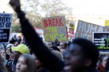 Demonstrators protest against slavery outside the Libyan embassy in London, Britain, December 9, 2017. PHOTO BY REUTERS/Peter Nicholls