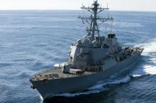 The guided-missile destroyer USS John S. McCain approaches the aircraft carrier USS George Washington for a fueling at sea in this December 5, 2010 handout photo courtesy of the U.S. Navy. PHOTO BY REUTERS/U.S. Navy/Mass Communication Specialist Seaman Cheng S. Yang
