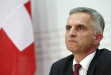 Swiss President and Foreign Minister Didier Burkhalter addresses a news conference on results in Bern