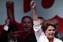 Brazil's President and Workers' Party (PT) presidential candidate Dilma Rousseff celebrates during news conference after disclosure of the election results, in Brasilia, October 26, 2014. PHOTO BY REUTERS/Ueslei Marcelino
