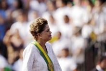 Brazil's President Dilma Rousseff stands in a vehicle during a civic-military parade to commemorate Brazil's Independence Day in Brasilia, Brazil, September 7, 2015. PHOTO BY REUTERS/Ueslei Marcelino
