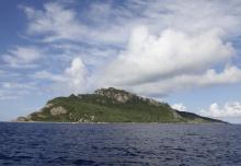 A group of disputed islands, Uotsuri island (top), Minamikojima (bottom) and Kitakojima, known as Senkaku in Japan and Diaoyu in China is seen in the East China Sea