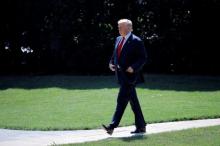U.S. President Donald Trump leaves the Oval Office as he departs for vacation in Bedminster, New Jersey, from the South Lawn of the White House in Washington, U.S., August 4, 2017. PHOTO BY REUTERS/Carlos Barria