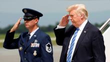 U.S. President Donald Trump returns a salute as he steps from Air Force One, en route to nearby Camp David to meet with the National Security Council to try to agree on a strategy for Afghanistan, in Hagerstown, Maryland, U.S., August 18, 2017. PHOTO BY REUTERS/Kevin Lamarque