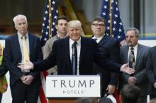 Republican U.S. presidential candidate Donald Trump speaks to the media during a news conference at the construction site of the Trump International Hotel at the Old Post Office Building in Washington, March 21, 2016. PHOTO BY REUTERS/Jim Bourg