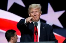 Republican presidential nominee Donald Trump points at the gathered media during his walk through at the Republican National Convention in Cleveland, U.S., July 21, 2016. PHOTO BY REUTERS/Rick Wilking