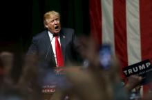 Republican presidential candidate Donald Trump addresses the crowd during a campaign rally in Grand Rapids, Michigan, December 21, 2015. PHOTO BY REUTERS/Rebecca Cook 