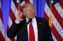 U.S. President-elect Donald Trump speaks during a news conference in the lobby of Trump Tower in Manhattan, New York City, U.S., January 11, 2017. PHOTO BY REUTERS/Lucas Jackson