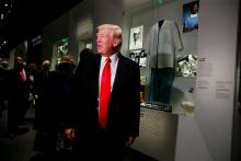 U.S. President Donald Trump pauses at the Dr. Ben Carson exhibit at the National Museum of African American History and Culture in Washington, U.S., February 21, 2017. PHOTO BY REUTERS/Jonathan Ernst