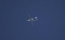 An Israeli drone flies over the West Bank city of Hebron in this June 14, 2014 file photo. PHOTO BY REUTERS/Ronen Zvulun