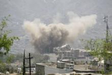 Dust rises from the site of a Saudi-led air strike in Yemen's southwestern city of Taiz, July 1, 2015. PHOTO BY REUTERS/Stringer