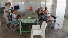Elderly residents of an old people's home sit in the home's dinning hall after it was attacked by gunmen in the Yemeni port of Aden, March 4, 2016. PHOTO BY REUTERS/Stringer