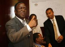 Emmerson Mnangagwa gestures to the opposition MDC agent at the start of the presidential election verification process in the capital Harare, May 1, 2008. PHOTO BY REUTERS/Howard Burditt