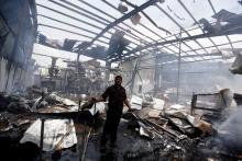 An employee shows the damages at a snack food factory after a Saudi-led air strike hit it in Sanaa, Yemen, August 9, 2016. PHOTO BY REUTERS/Khaled Abdullah