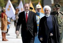 Turkish President Tayyip Erdogan (L) is seen with his Iranian counterpart Hassan Rouhani during a welcoming ceremony at the Presidential Palace in Ankara, Turkey. April 16, 2016. PHOTO BY REUTERS/Murat Cetinmuhurdar