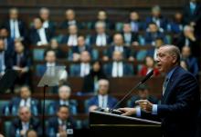 Turkish President Tayyip Erdogan addresses members of parliament from his ruling AK Party (AKP) during a meeting at the Turkish parliament in Ankara, Turkey, October 23, 2018. PHOTO BY REUTERS/Murat Cetinmuhurdar/Presidential Press Office