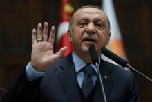 Turkish President Tayyip Erdogan addresses members of parliament from his ruling AK Party (AKP) during a meeting at the Turkish parliament in Ankara, Turkey, January 8, 2019. PHOTO BY REUTERS/Umit Bektas