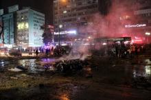Emergency workers work at the explosion site in Ankara, Turkey, March 13, 2016. PHOTO BY REUTERS/Tumay Berkin