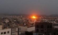 An explosion is seen after a Saudi-led air strike hit the weapons depots at a Houthi-controlled military base in Yemen's capital Sanaa, September 12, 2015. PHOTO BY REUTERS/Mohamed al-Sayaghi