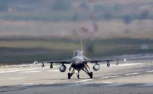 A Turkish Air Force F-16 fighter jet lands at Incirlik air base in Adana, Turkey, August 11, 2015. PHOTO BY REUTERS/Murad Sezer