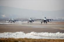 U.S. Air Force F-16 fighter jets take part in a joint aerial drill exercise called 'Vigilant Ace' between U.S. and South Korea, at the Osan Air Base in Pyeongtaek, South Korea, December 6, 2017. PHOTO BY REUTERS/Kim Hong-Ji