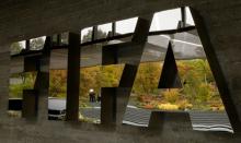 A TV team is reflected in a logo of FIFA a meeting of the FIFA Council at its headquarters in Zurich, Switzerland, October 13, 2016. PHOTO BY REUTERS/Arnd Wiegmann